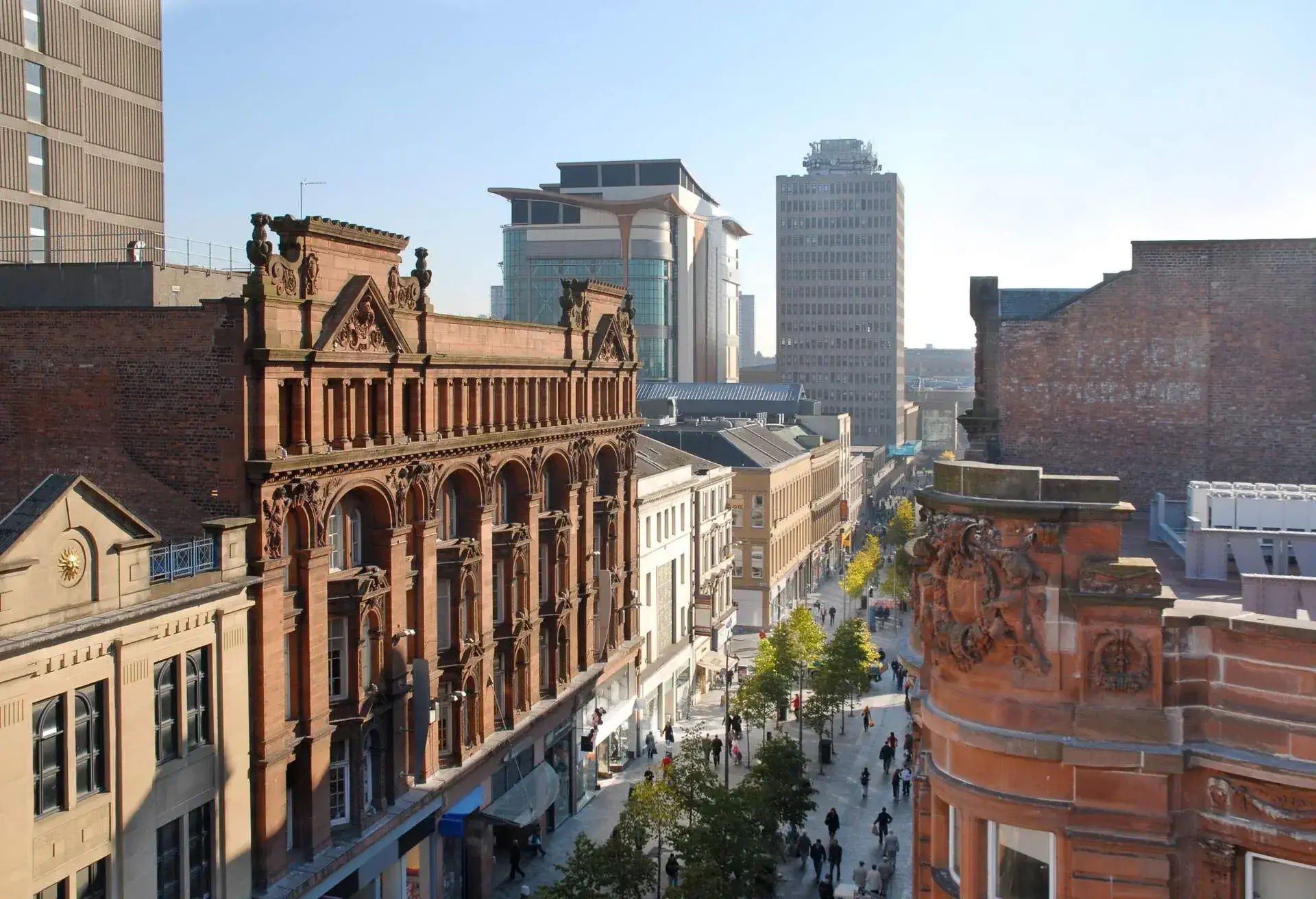 One of the main shopping streets in Glasgow, UK. About 10am on a sunny and crisp autumn day.