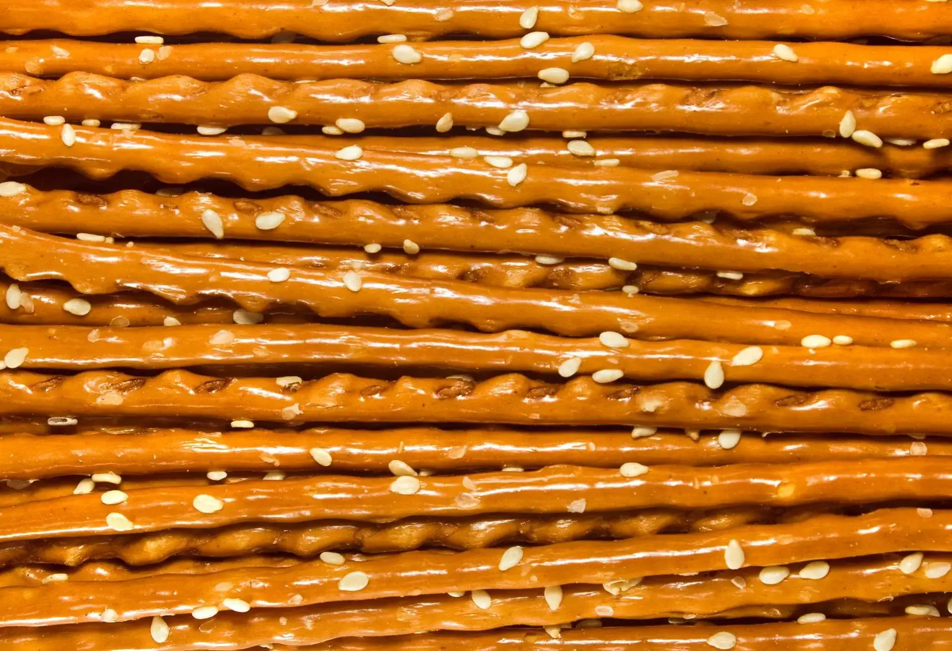 horizontal-macro shot of pretzel sticks with sesam