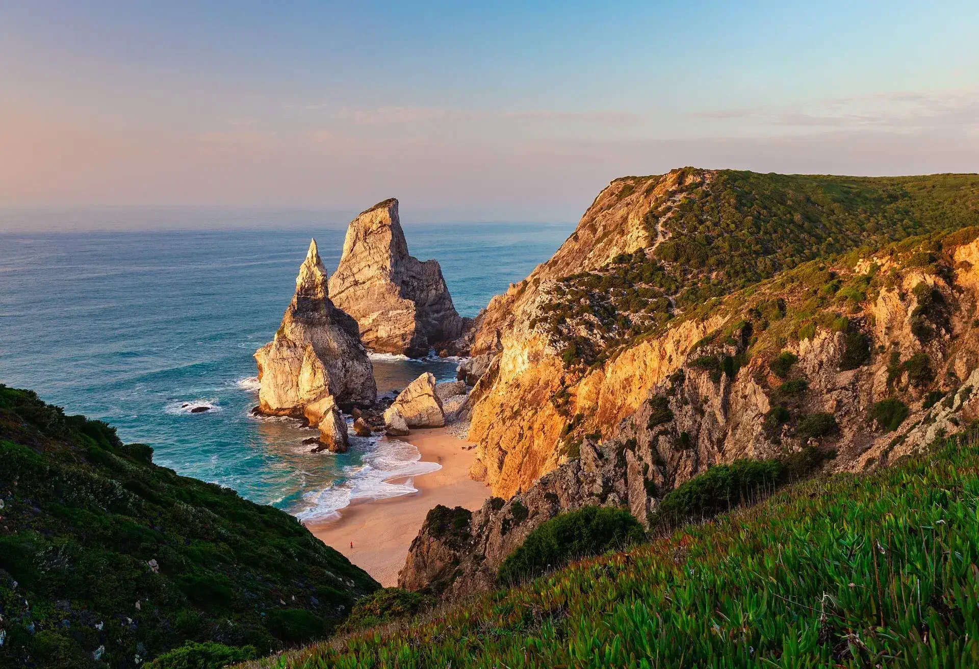 Outcropping Rock formations on Atlantic Ocean coastline. Ursa Beach or Praia da Ursa in Sintra, Portugal