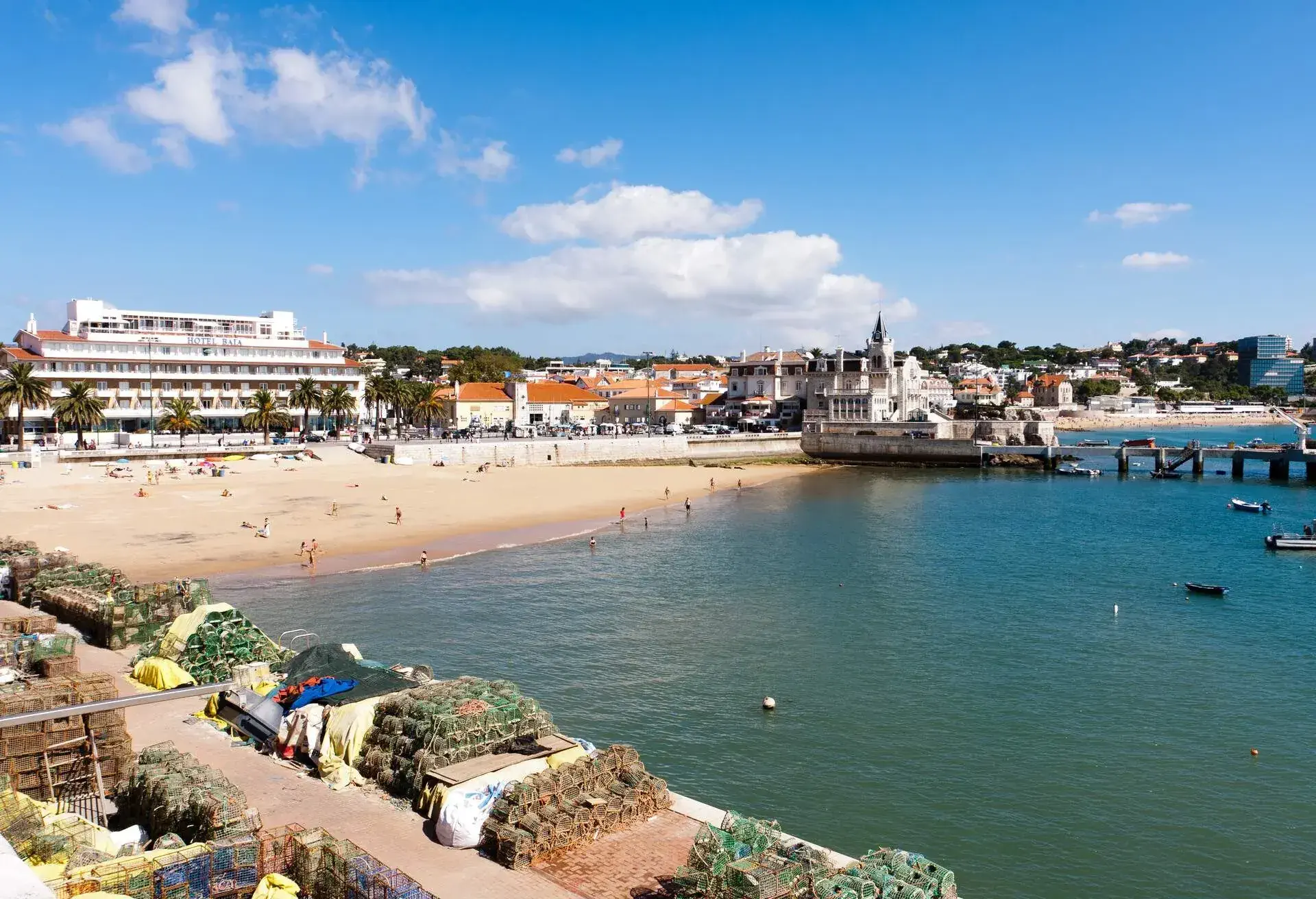 View of Cascais port, beach and castle.