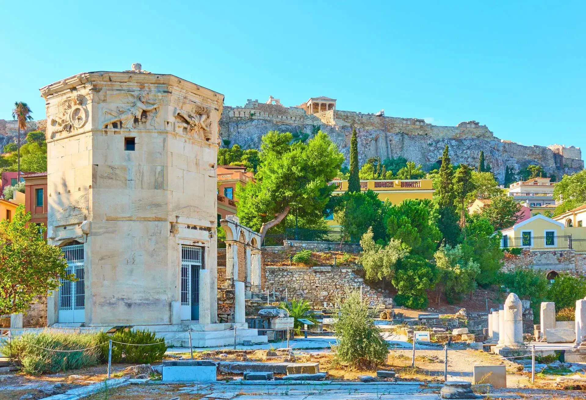 Ruins of The Roman Forum and Plaka district on the slope of Acropolis hill in Athens in the morning, Greece