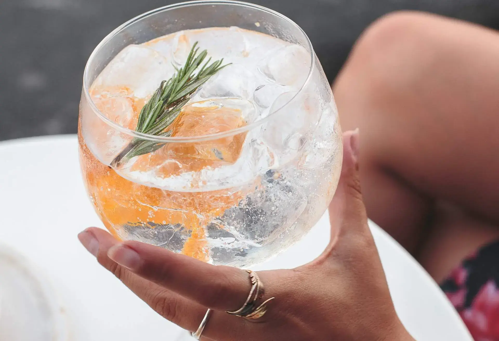 DEST_PORTUGAL_LISBON_WOMAN_DRINK_SUMMER_GettyImages-1077720462_Universal