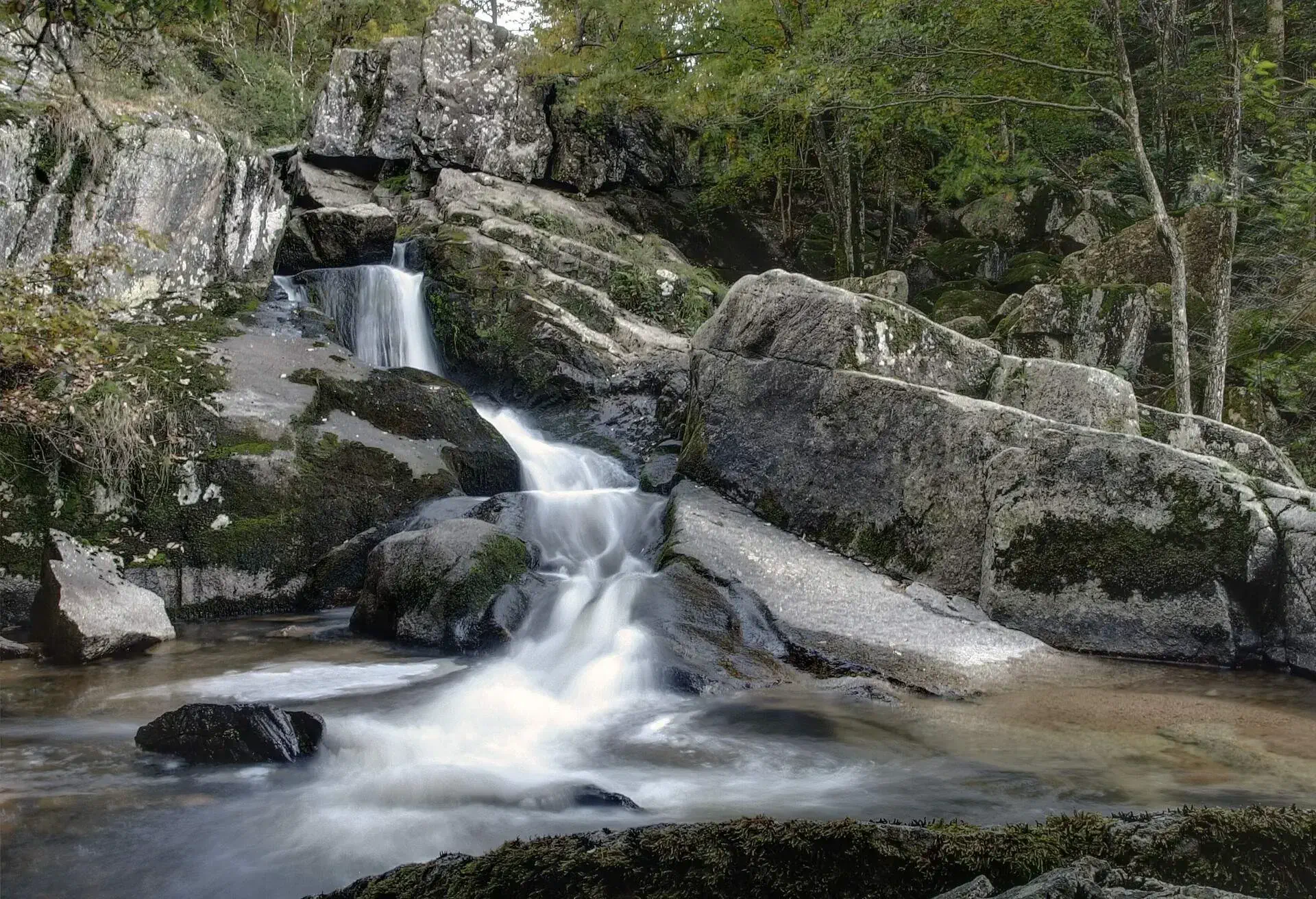 Waterfall Pisserotte on Barbenan river near Arfeuilles, Auvergne, France.