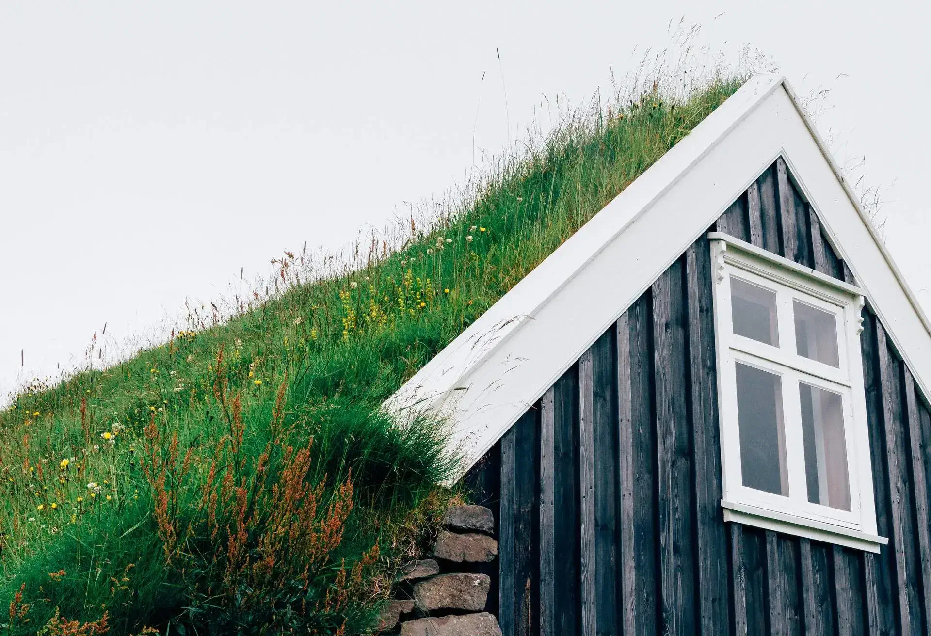 The Selið turf houses in Skaftafell national park in Iceland were built in 1912. The last inhabitants abandoned them in 1946. The turf houses are surrounded wild flowers and are perched on a hill overlooking the river and the surrounding countryside.