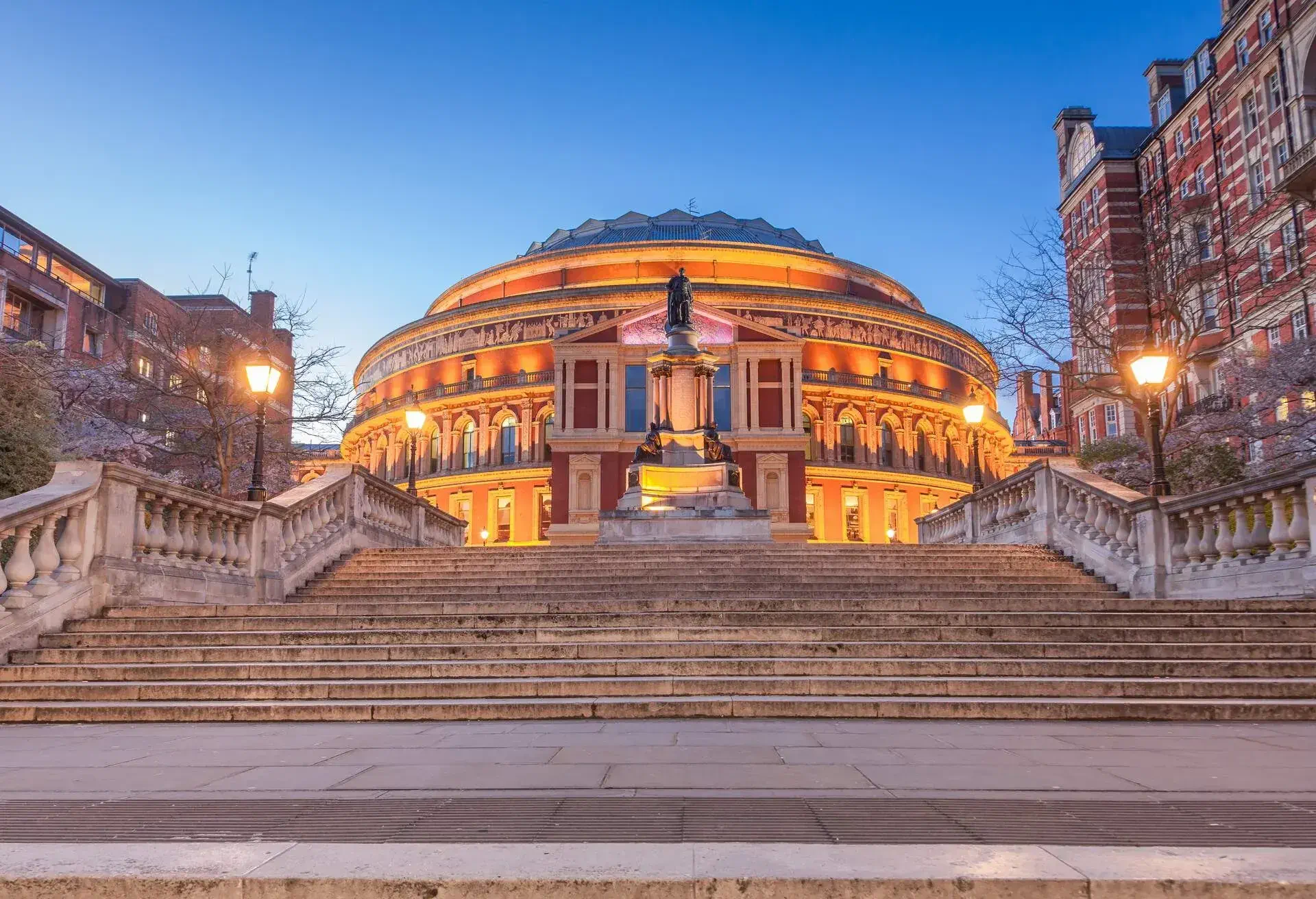 Lovely square on Kensington area with spectacular view at Royal Albert Hall in London at dusk time.
