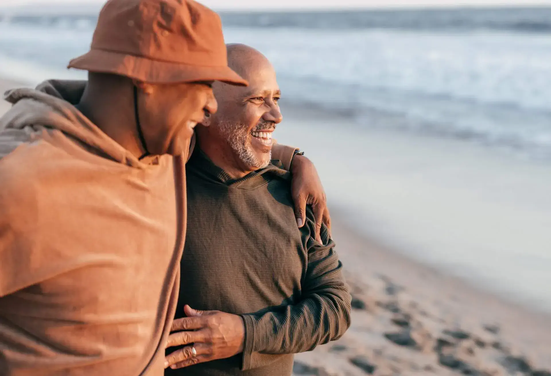 Senior gay couple on the beach