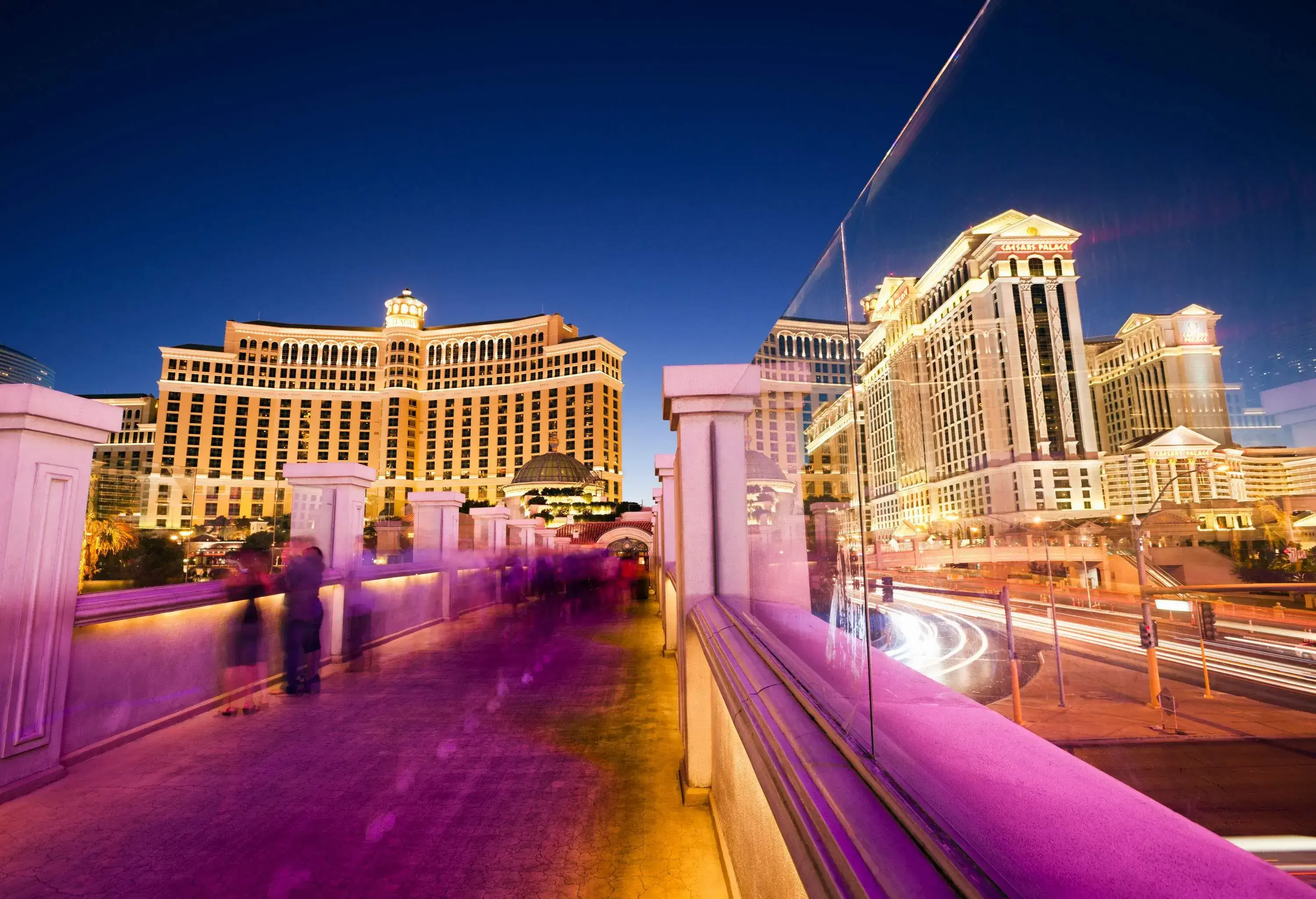 A roadside walkway with sweeping views of the city's massive structures.