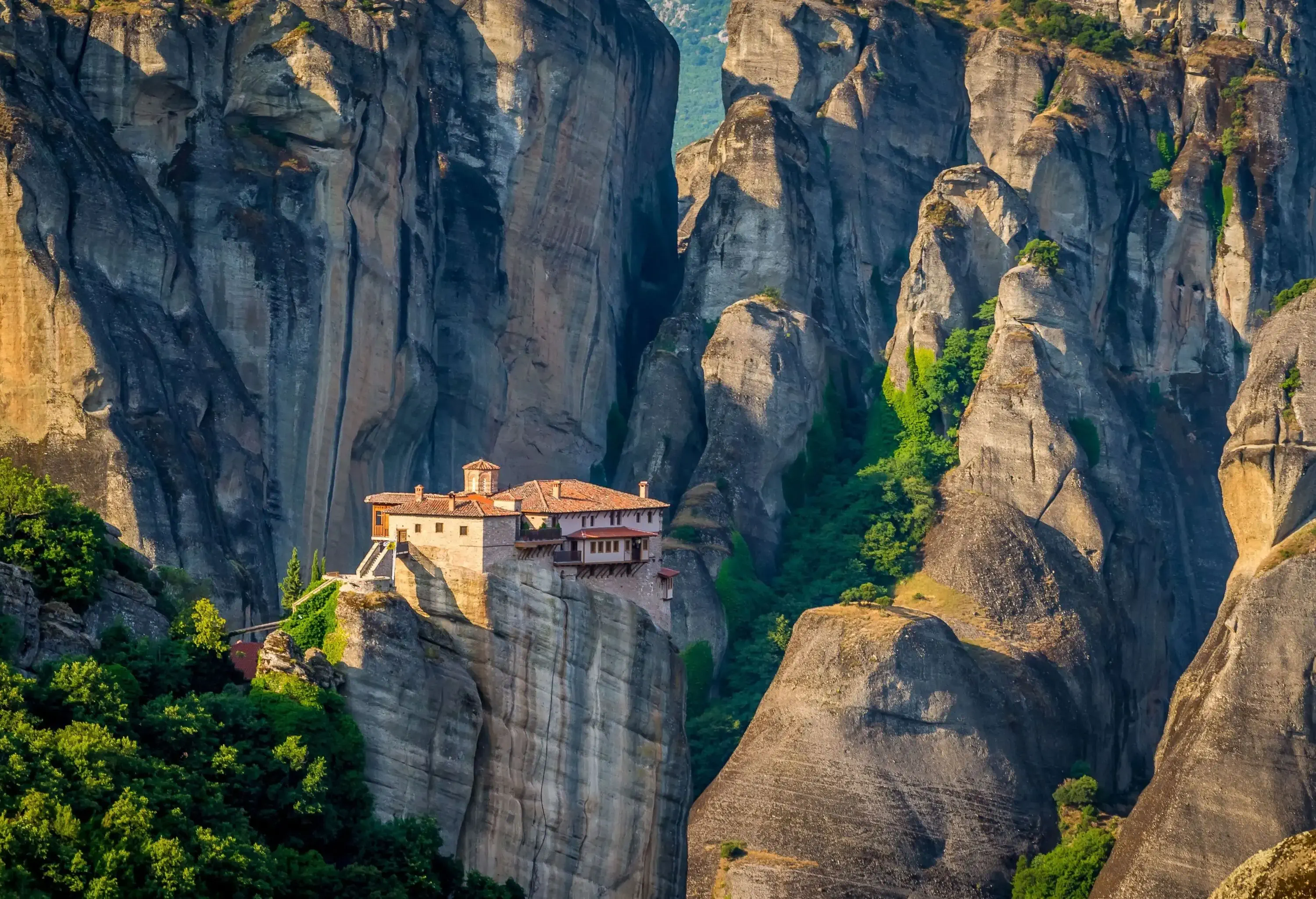 Ancient monastery built info large rock formation