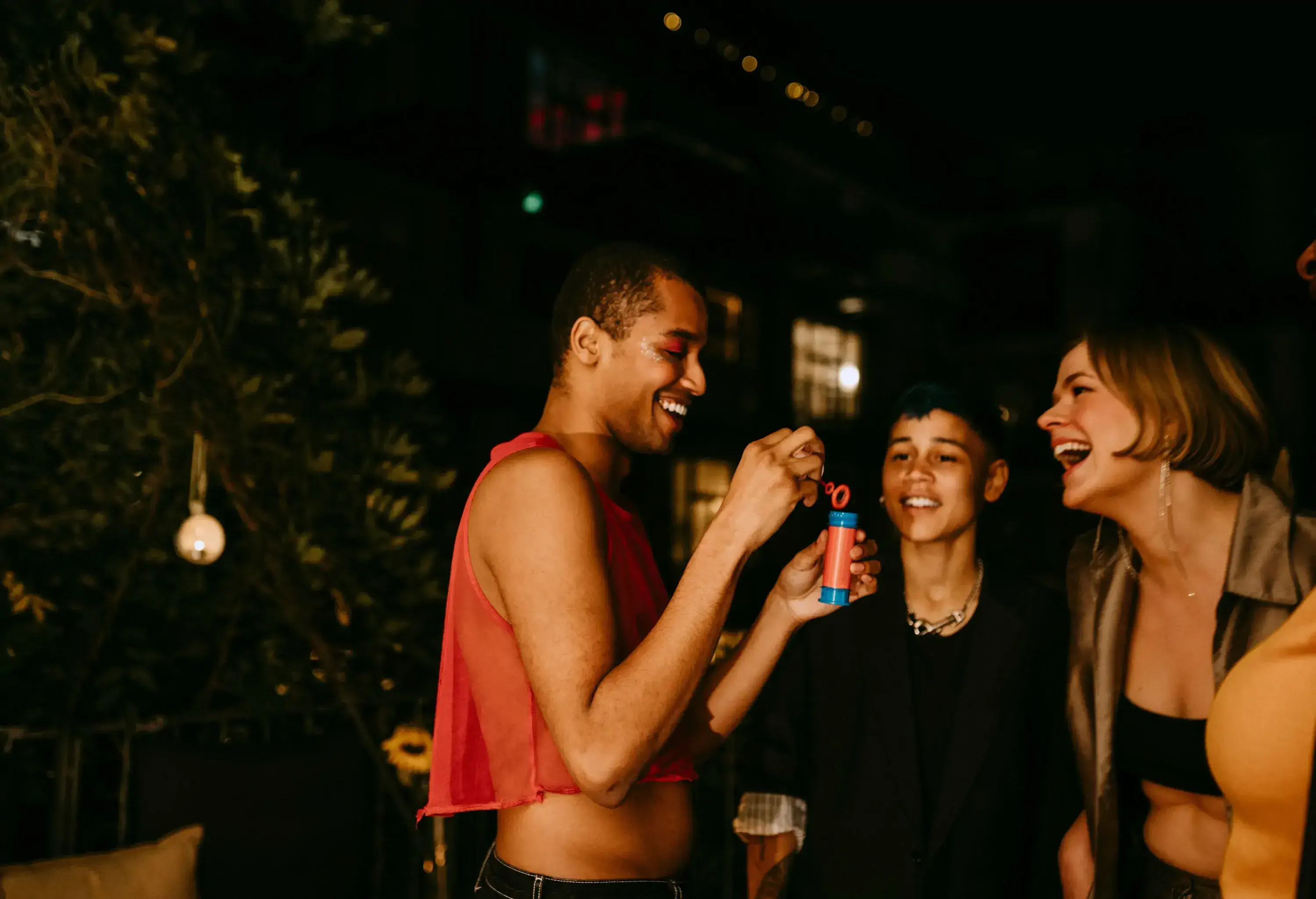 A group of young people having a good time at a party.